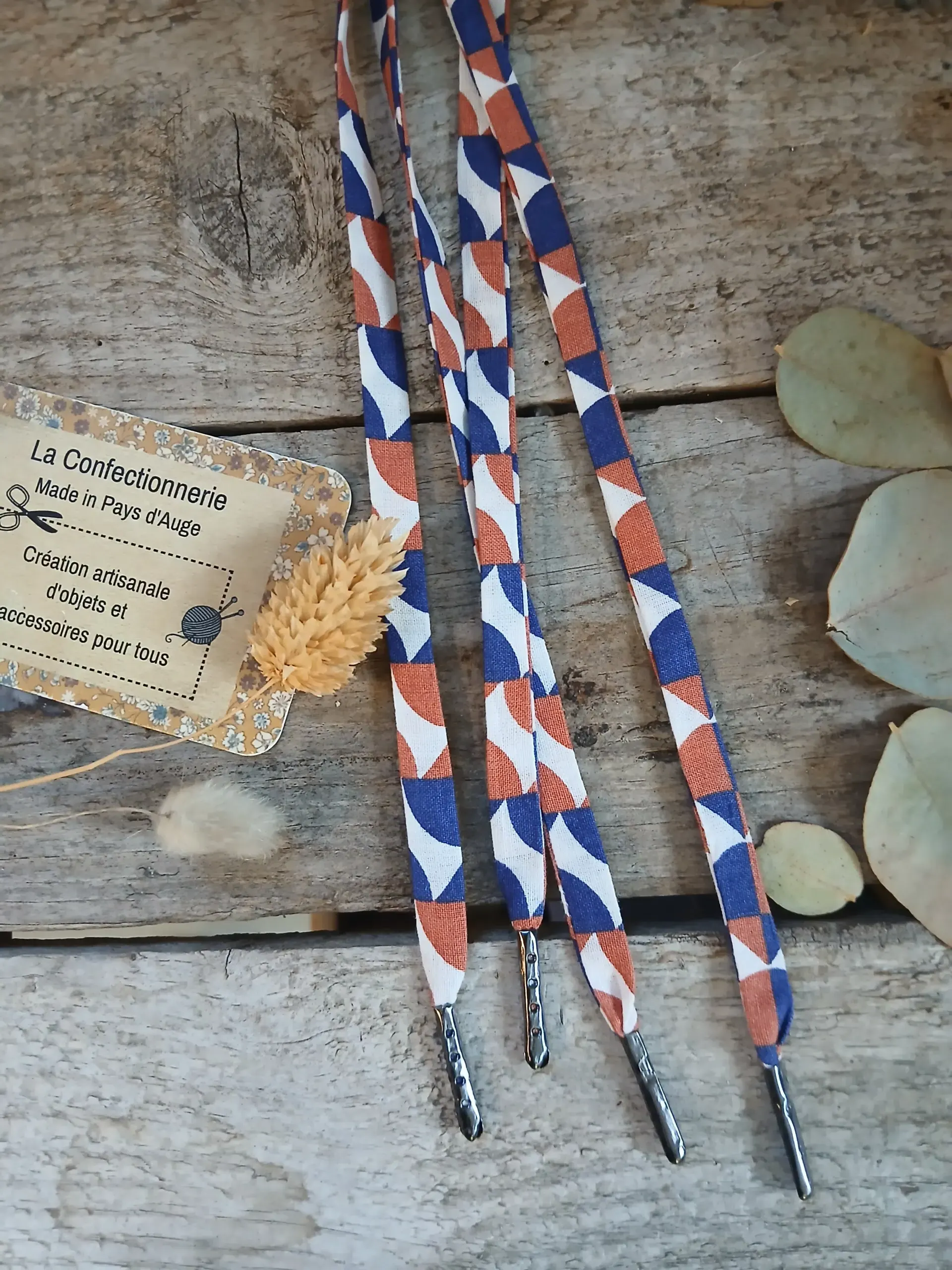 Lacets fantaisie en tissu – géométrique bleu/terracotta 6 œillets