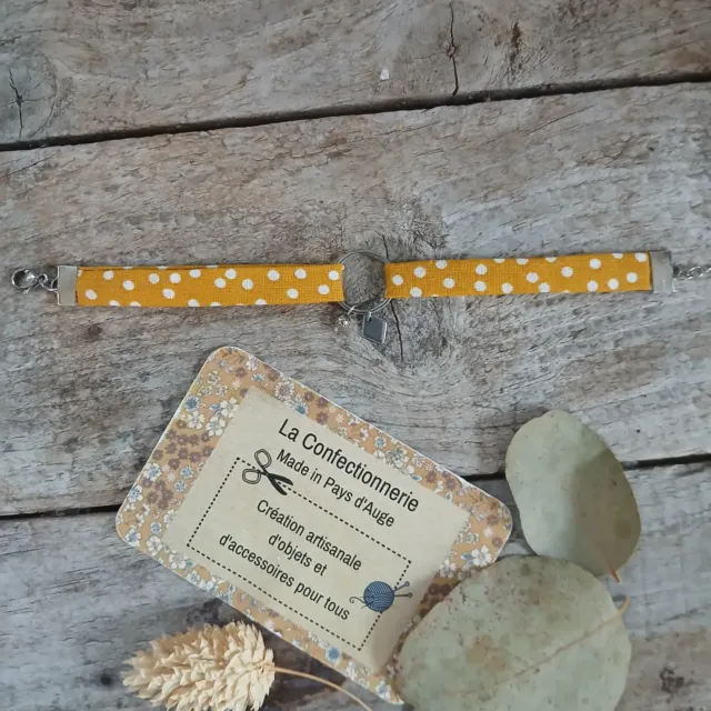 Bracelet en tissu et acier inoxydable argenté – Réglable – Jaune à pois blancs